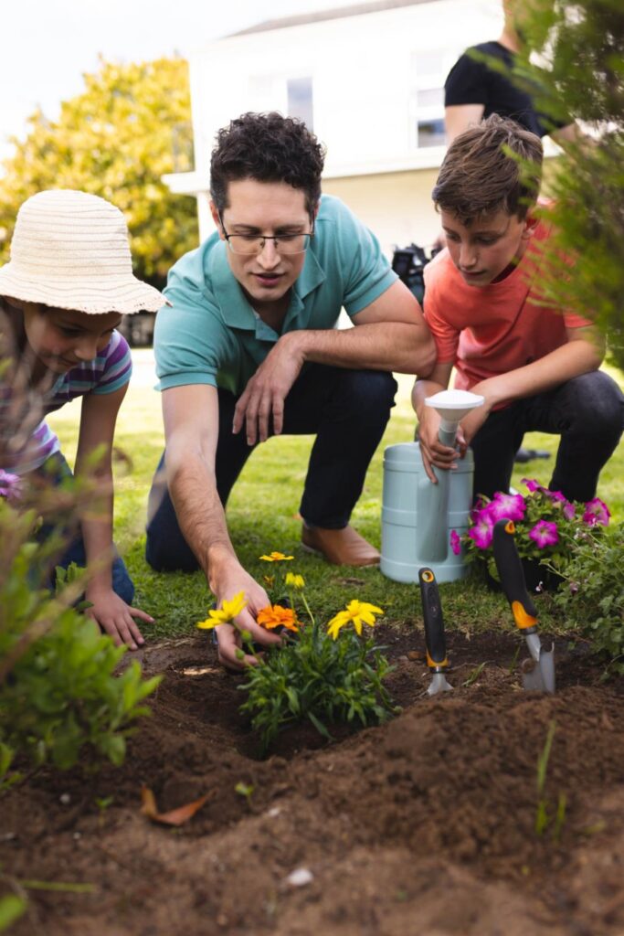 a family is doing gardening together