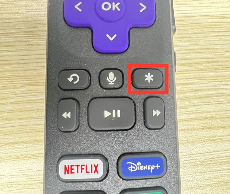 asterisk button of a roku remote is highlighted