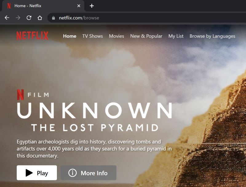 tap Play to watch a movie on the Netflix website on a Windows laptop