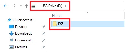 The folder name PS5 is stored inside a USB flash drive