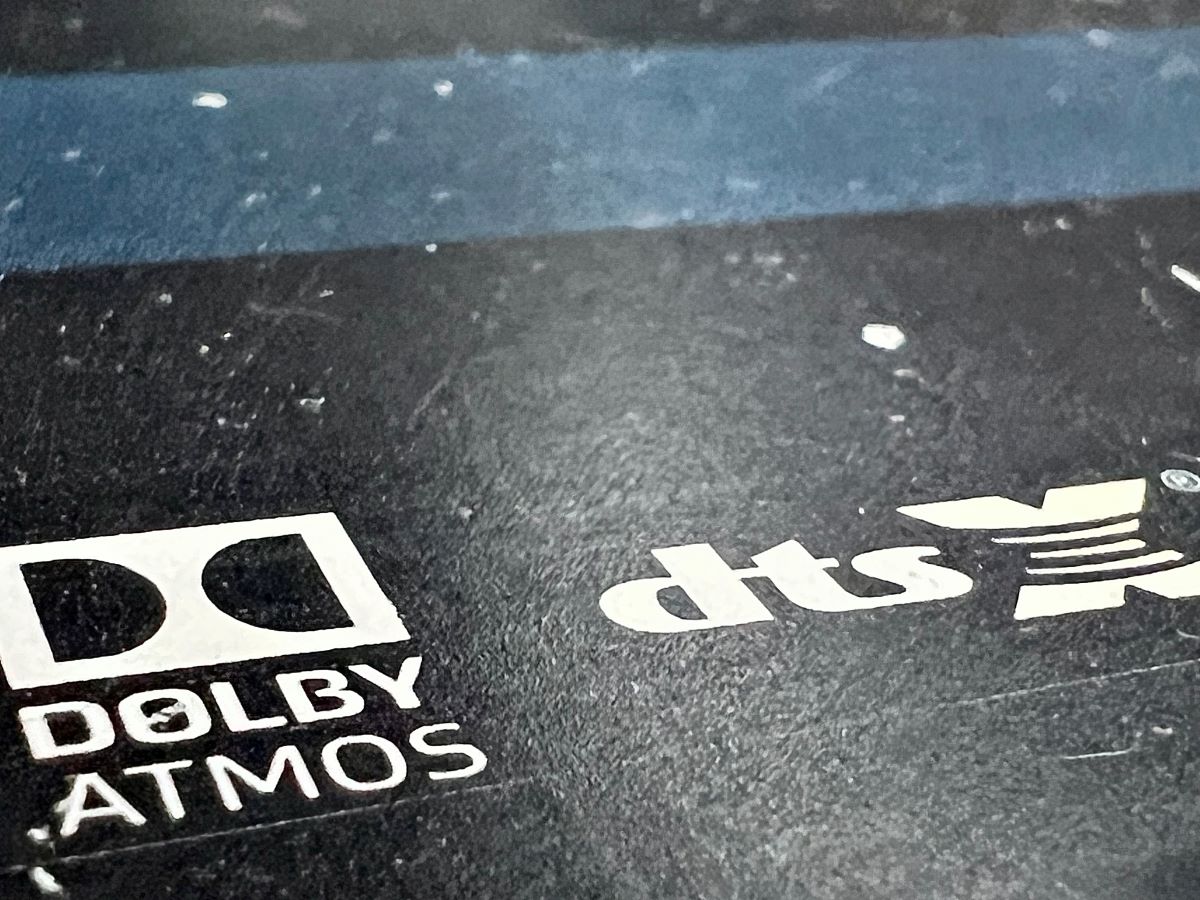 dolby atmos and dtsX text on a soundbar