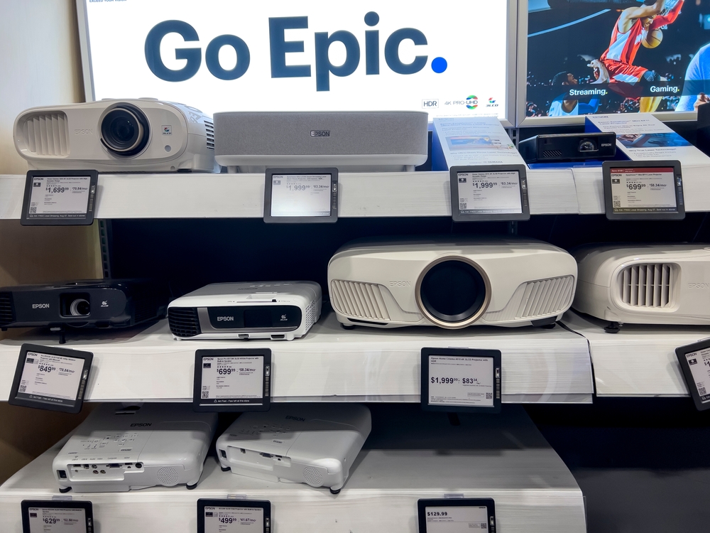 many epson projectors on shelf
