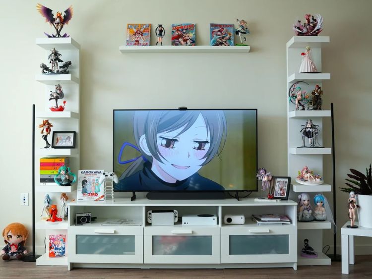figures around a tv