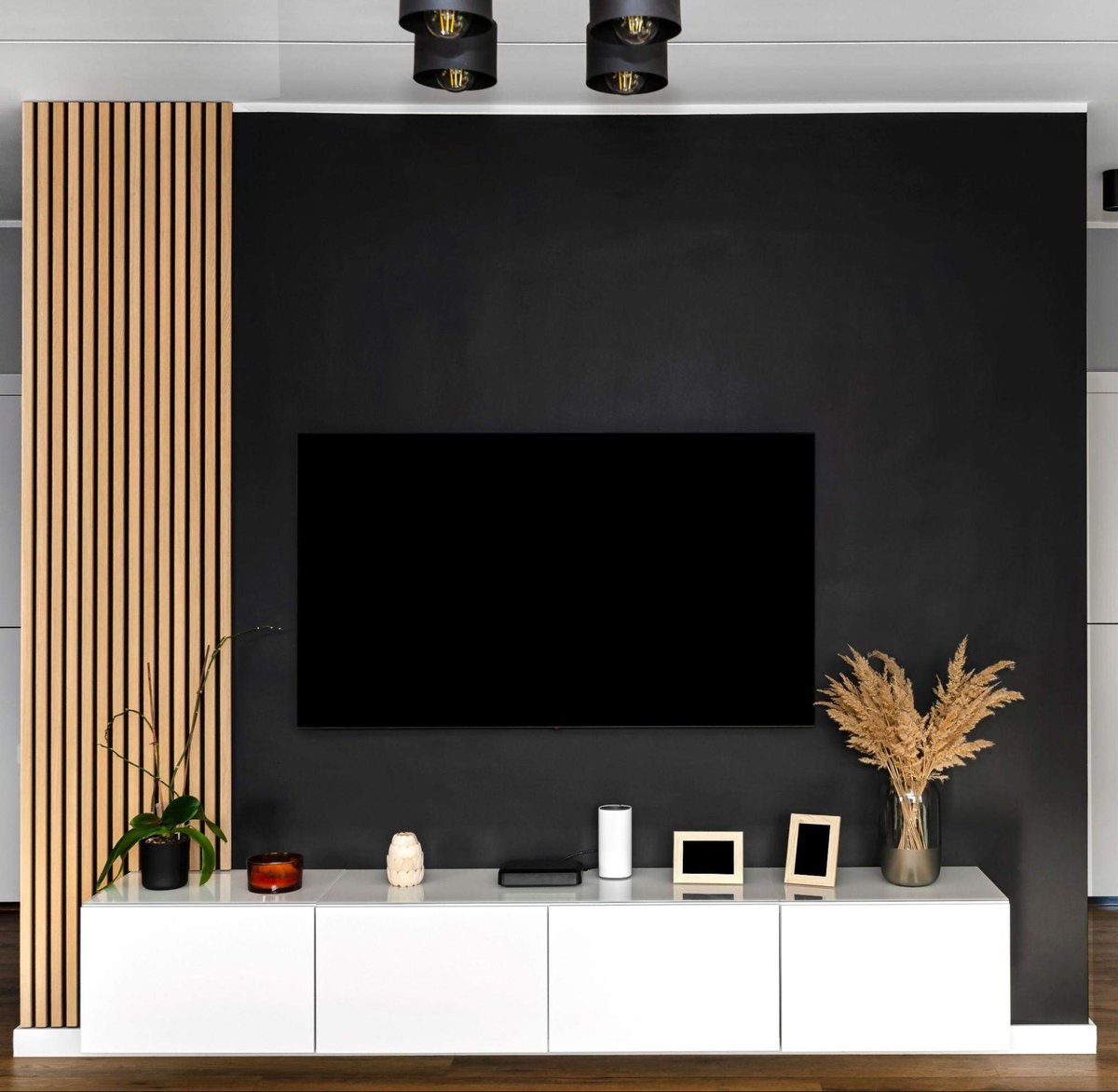 mounted tv above a floating tv stand 