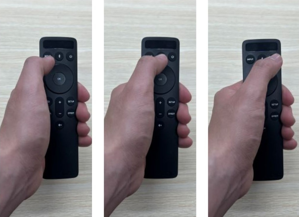 The image describes a hand is pressing all the buttons on the the Vizio remote
