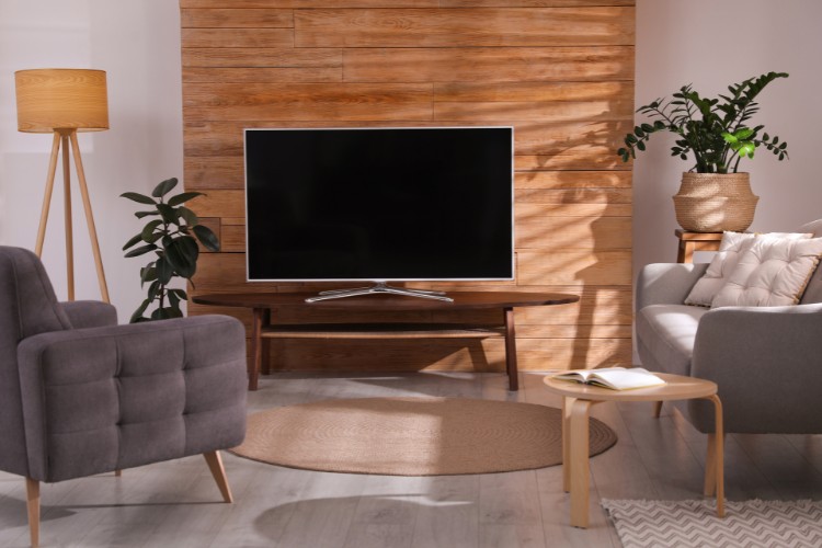 Wodden TV stand and wall backdrop, and TV in the modern Living room