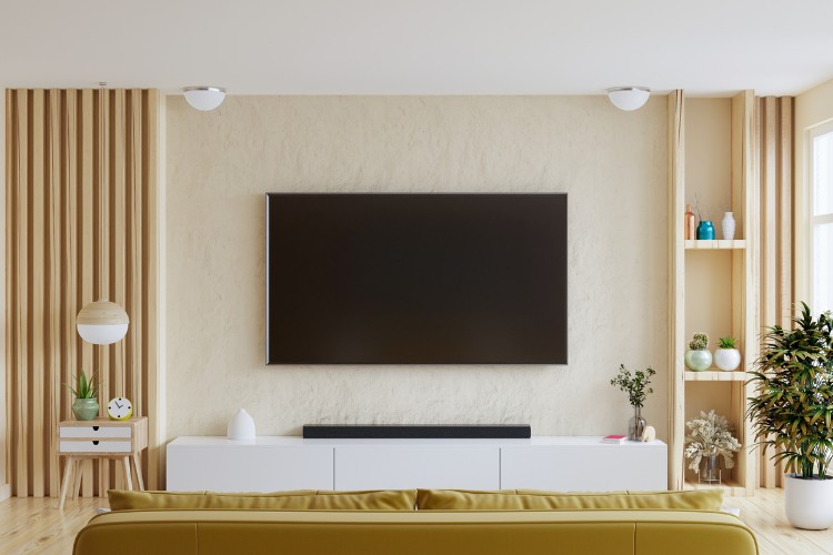 couch, TV stand, and TV in the open and fresh modern Living room