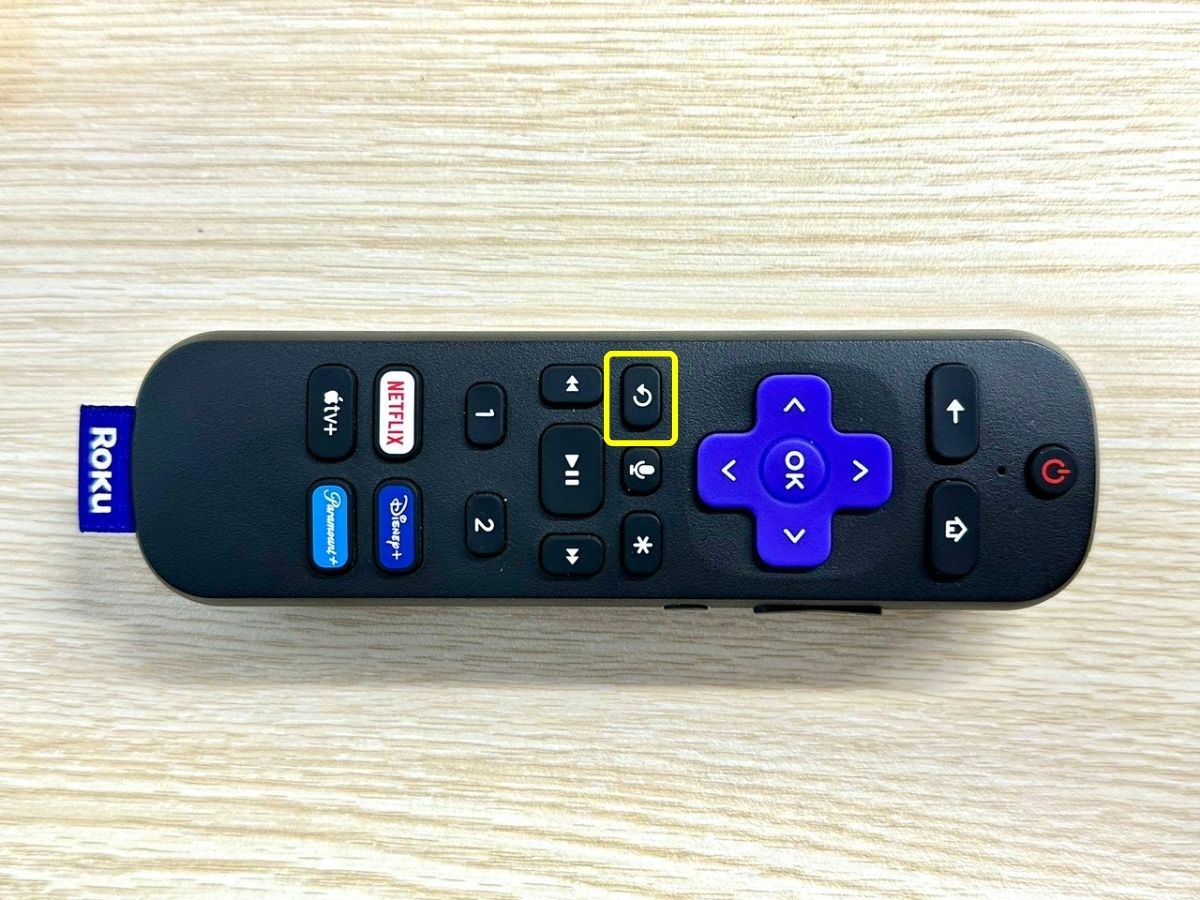 roku remote's instant replay button is highlighted