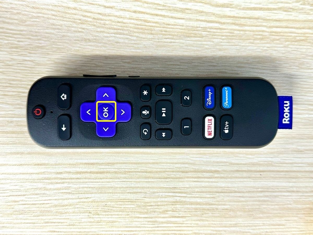 roku remote's ok button is highlighted